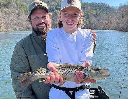 Posing with fish caught on lake