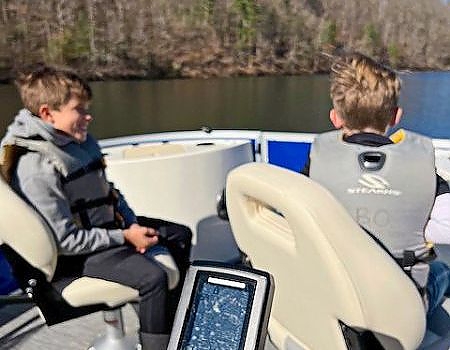 Two boys pose during Blue Ridge fly-fishing trip